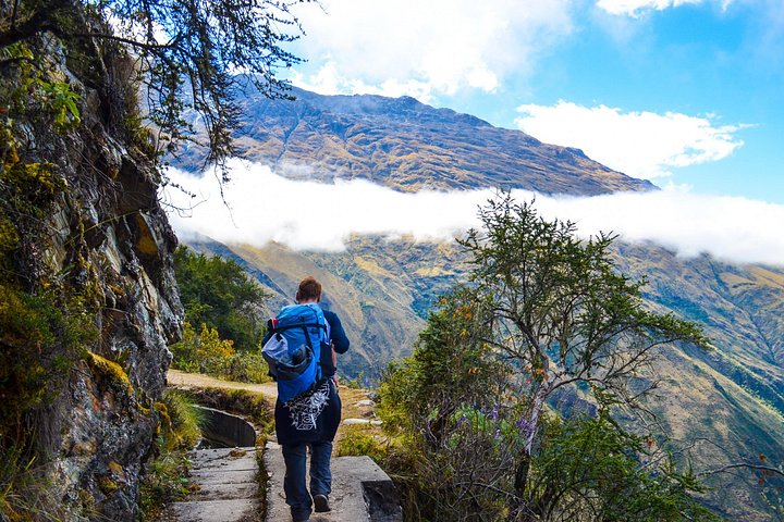 A trekker on a mountain trail near Salkantay