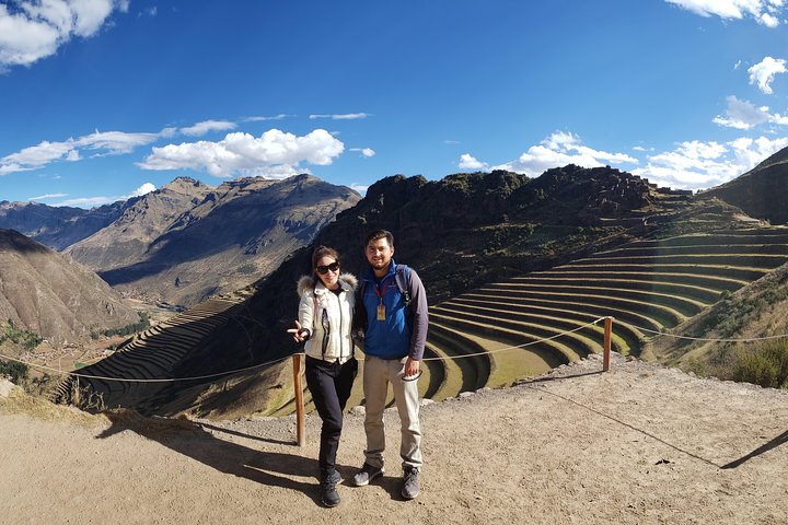 Two visitors above the terraces of the Sacred Valley