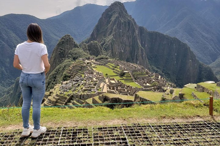 A visitor looking over Machu Picchu